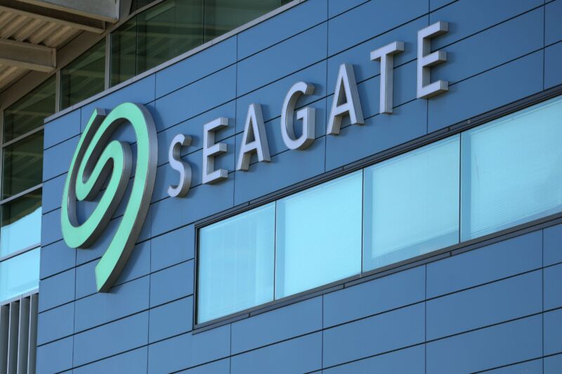 Exterior view of a Seagate office building, with a large Seagate logo on the side of the building.