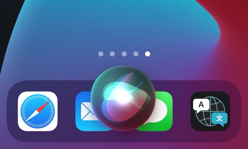 A Siri logo in an iOS interface near the iPhone's dock