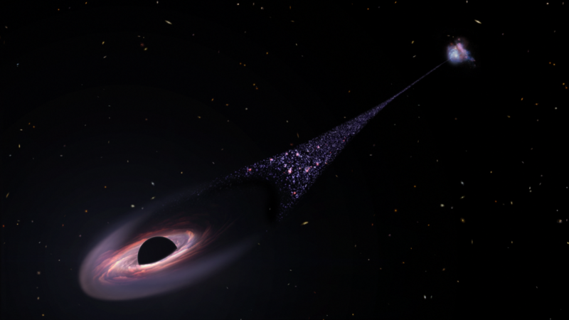 A black hole loops between galaxies, leaving behind stars – Ars Technica A black hole loops between galaxies, leaving behind stars – Ars Technica