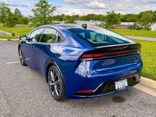 A blue Toyota Prius seen from the rear 3/4