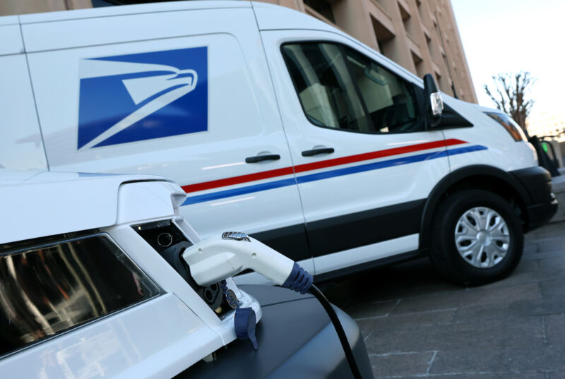 A closeup of the NGDV nose with a USPS van in the background