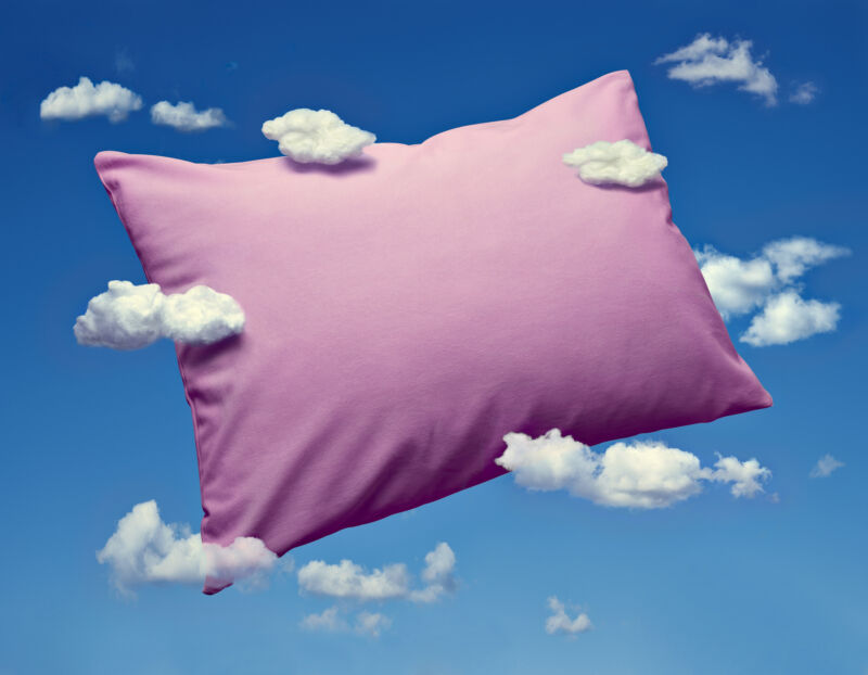 Image of a pillow surrounded by clouds.