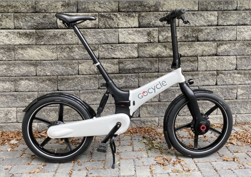 Image of a white foldable bicycle.