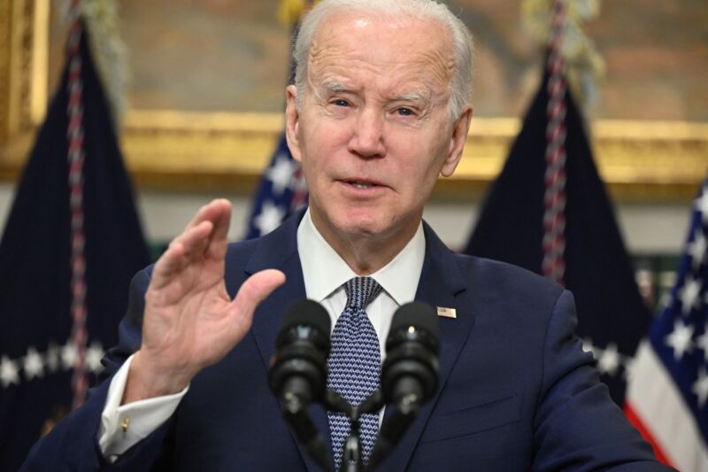 Joe Biden speaking into a microphone