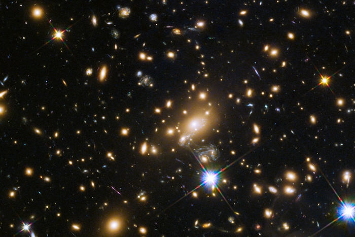 Afbeelding van een veld vol sterren en sterrenstelsels