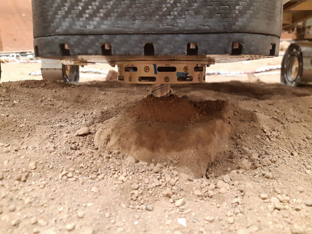 The Rosalind Franklin rover’s drill, pictured here in simulated Mars terrain, can reach up to two meters beneath Mars’s surface, deeper than attempted by any other rover on the Red Planet. It will provide samples for the rover’s mass spectrometer to investigate for signs of life.