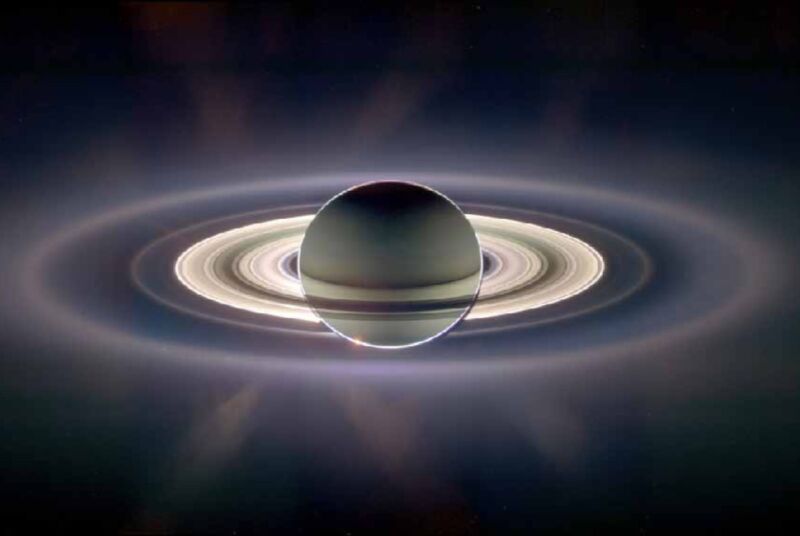 Backlit view of Saturn and its rings taken by Cassini in 2006