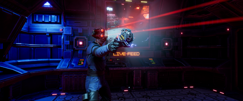 Cyborg pointing a pistol in front of a screen in System Shock