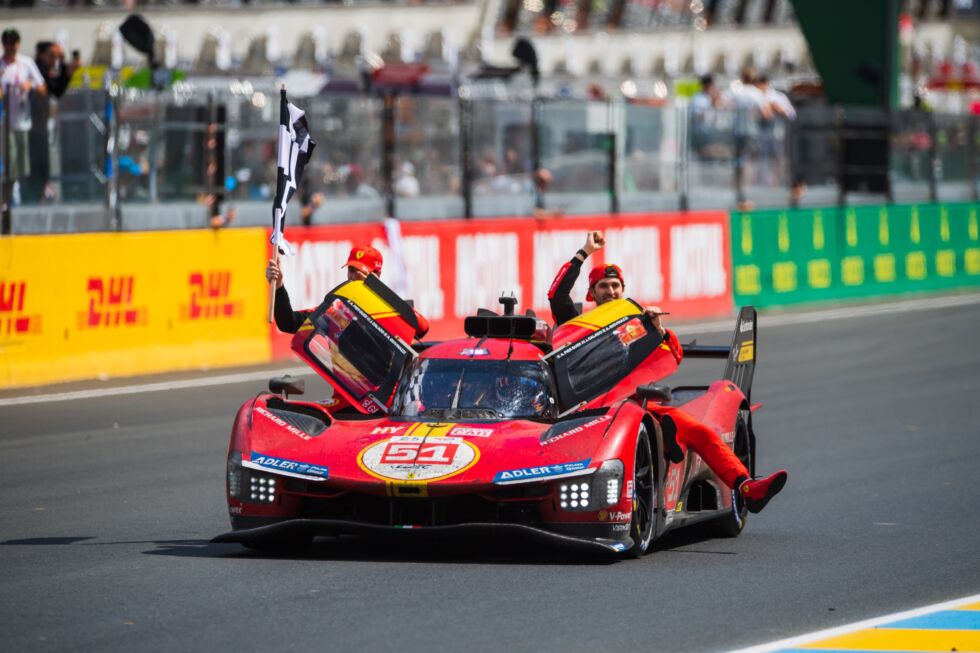 James Calado (L) and Antonio Giovinnazi (R) celebrate as Alessandro Pier Guidi brings the winning car into the pit lane after the race .