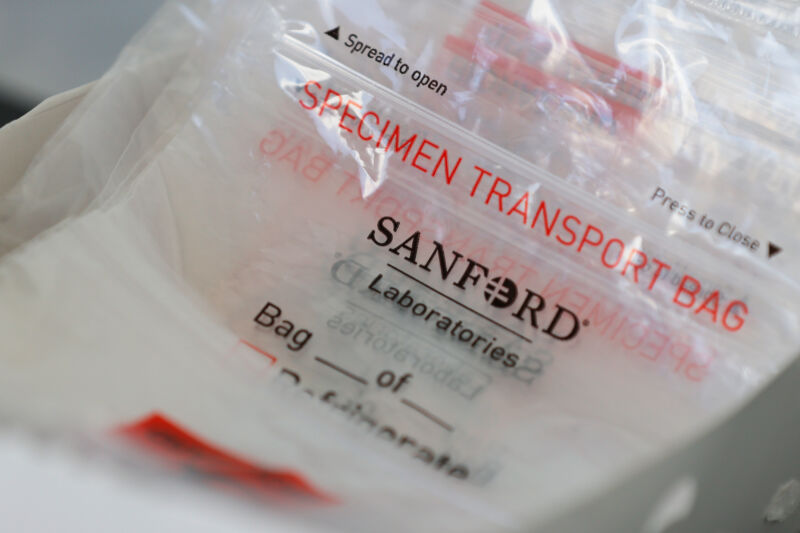 Bags to hold clinical samples labeled with Sanford Health.