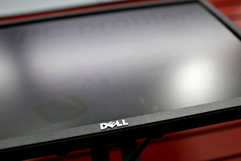 A Dell computer monitor sits on display inside a Staples store in New York, U.S.