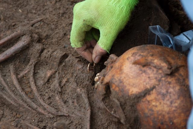 The Trumpington Cross is found during the excavation of the burial in 2012