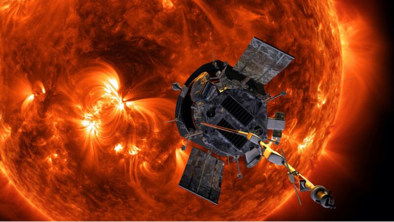 Image of a satellite in front of the surface of the Sun.
