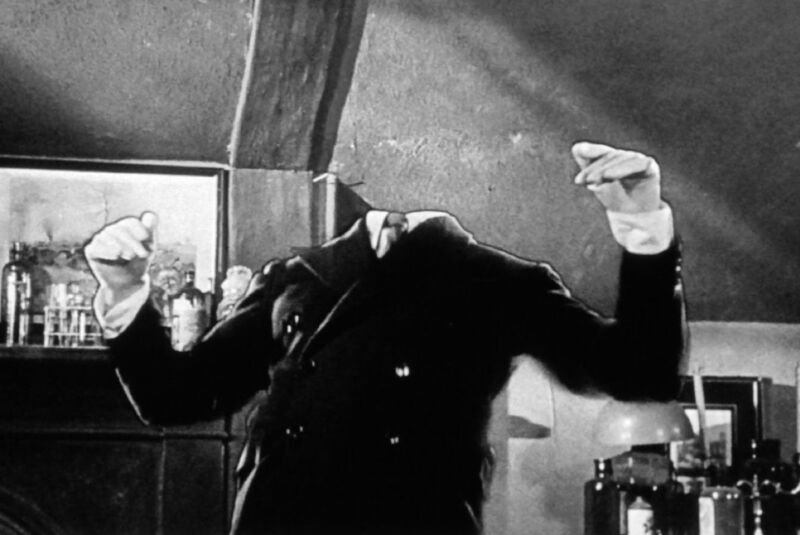 Still from 1933 film showing man with an invisible head