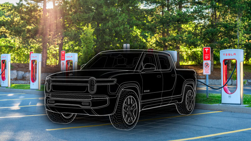 A silhouette of a Rivian truck at a bank of Tesla superchargers