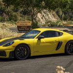 A yellow Porsche Cayman GT4 RS