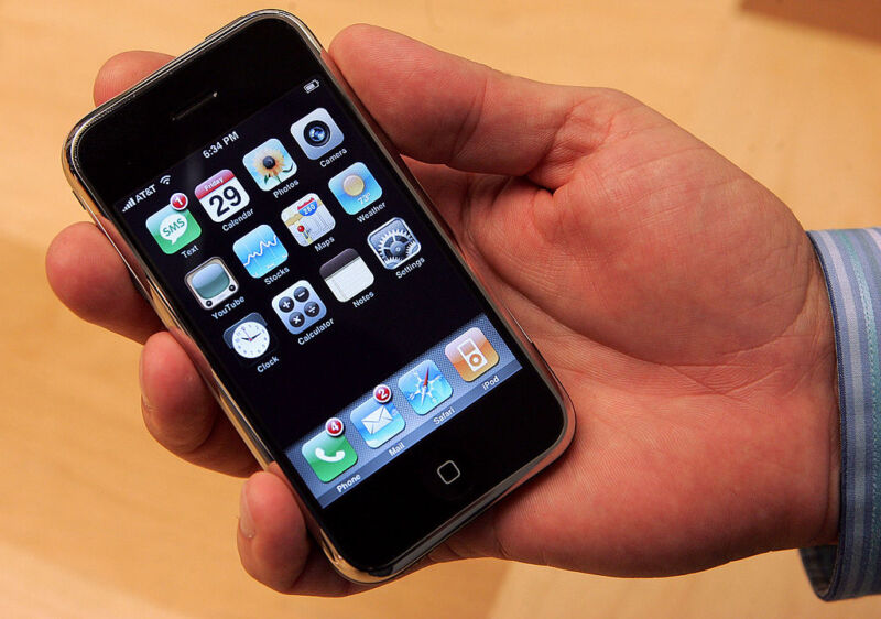 A customer holds the new Apple iPhone June 29, 2007 in San Francisco, California.