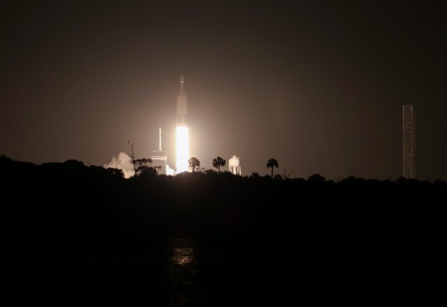 SpaceX's Falcon Heavy rocket lifts off from NASA's Kennedy Space Center on Friday night.