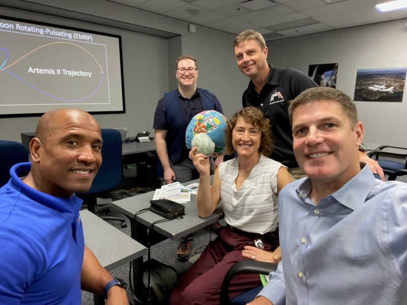 Astronauts Victor Glover, Christina Koch, Reid Wiseman, and Jeremy Hansen are joined by an instructor (background) on the first day of Artemis II crew training.