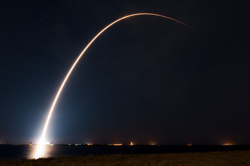 A Falcon 9 rocket streaks into the sky over Cape Canaveral, Florida, on a mission Sunday night to deploy 22 more Starlink internet satellites.