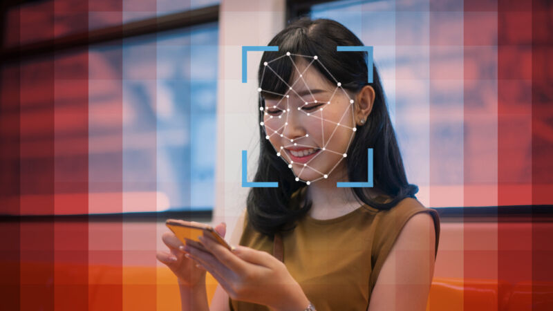 A woman being facially recognized by AI.
