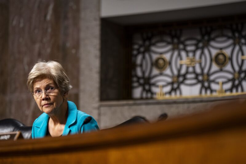Senator Elizabeth Warren sits during a Senate committee hearing.