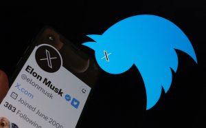 Illustration includes an upside-down Twitter bird logo with an "X" where the bird's eye would be. Elon Musk's Twitter profile is also displayed on a smartphone screen.