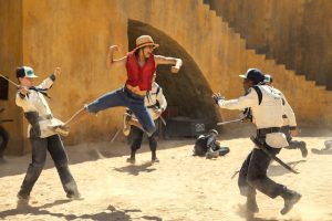 fight scene with boy in straw hay executing flying back kick