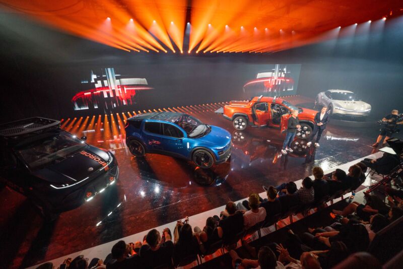 Four Fisker EVs on stage