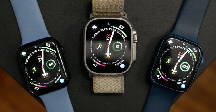 Apple Watch models set out on a table