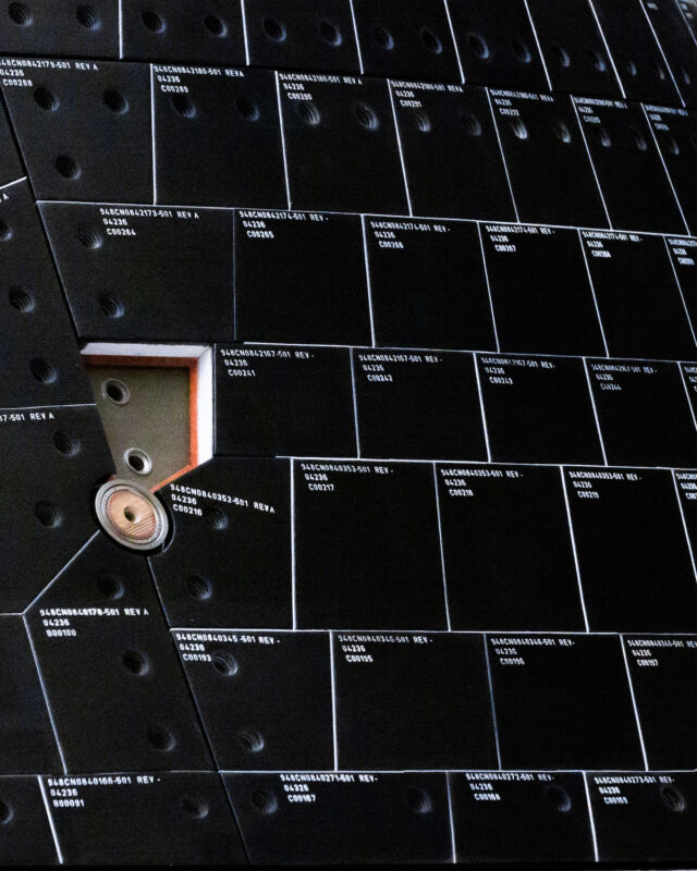 Super-telephoto view of the Orion spacecraft's heat shield tiles.