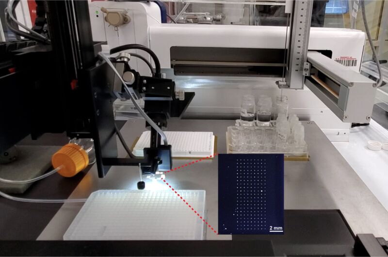 Image of a robotic printer and some samples it has prepared.