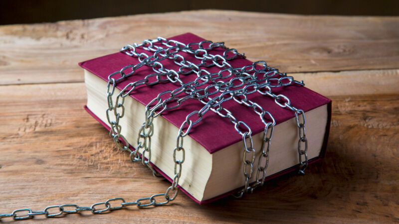 A book wrapped in chains.