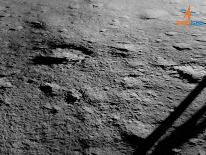 The first view from the Moon's surface captured by Chandrayaan 3's Vikram lander, showing the shadow of one of the craft's landing legs.
