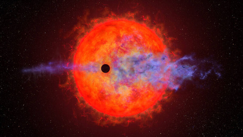 Image of a cloud of blue gas and a planet in front of a small, red star.