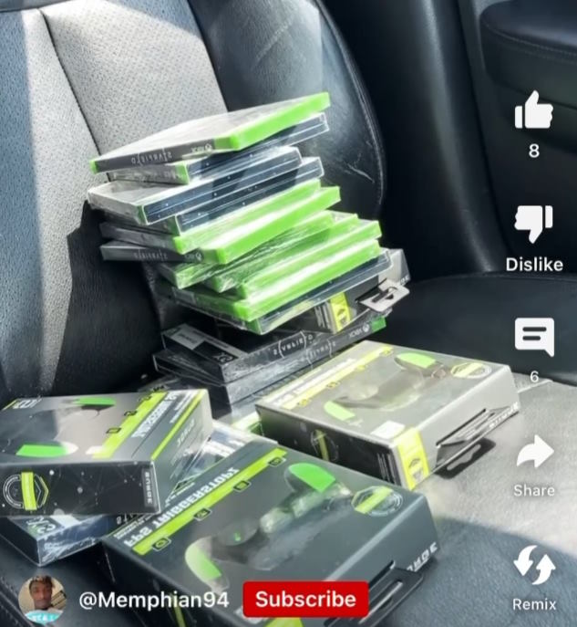 A pile of <em>Starfield</em> discs sits on a car seat in a video posted by Harris. 