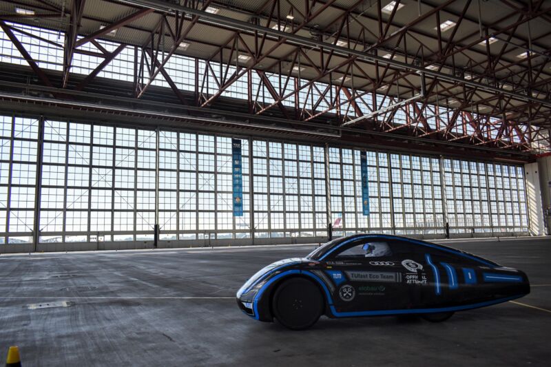 A streamlined EV inside an aircraft hanger