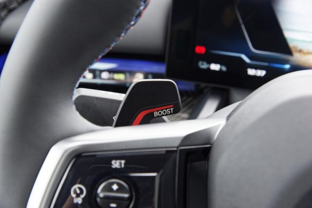The boost paddle on a BMW i5 steering wheel