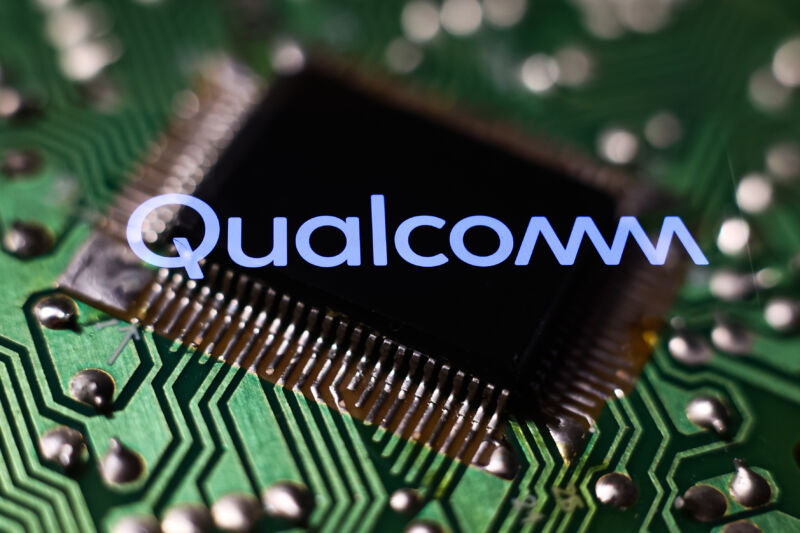 Microchip and Qualcomm logo displayed on a phone screen are seen in this multiple exposure illustration photo