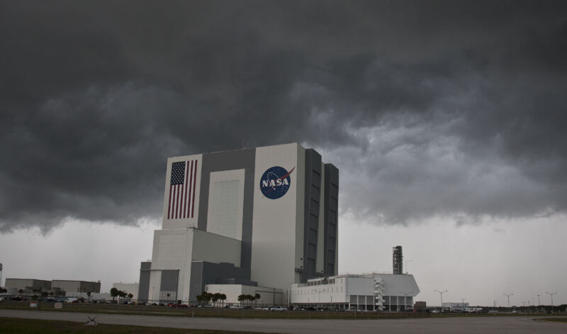 Storm clouds roll past NASA's VAB or Vehicle Assembly Building at Kennedy Space Center in Houston.