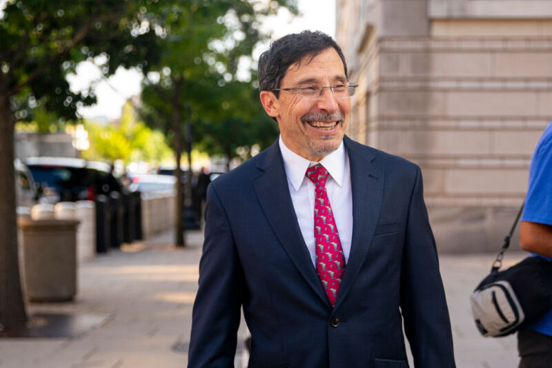 Kenneth Dintzer, litigator for the US Department of Justice, exits federal court in Washington, DC, on Tuesday, Sept. 12, 2023.