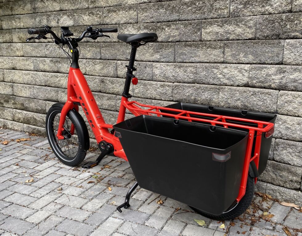 The extend rear rack with two cargo panniers attached. It can also be topped with seating for two children.