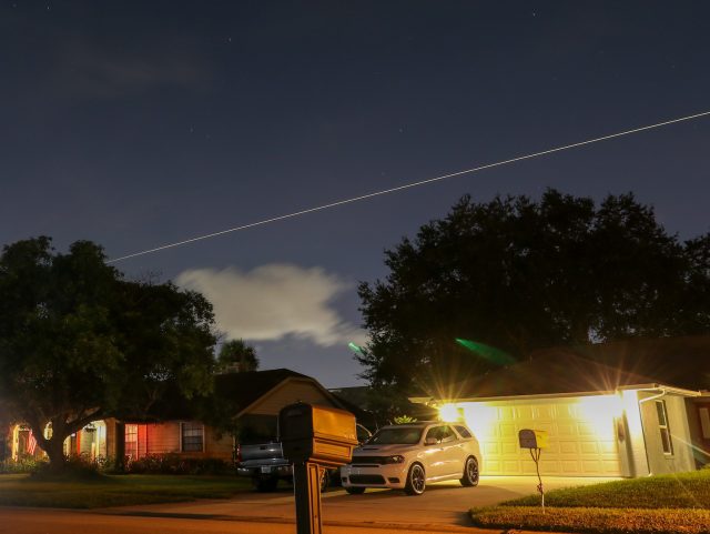 SpaceX's Crew Dragon capsule lifts off over Orlando, Florida, on its way to landing.