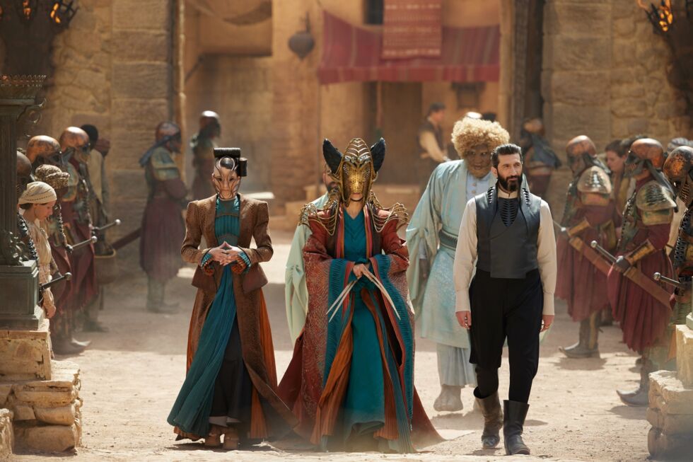 A glimpse of the Seanchan, among others. High Lady Suroth (Karima McAdams) stands flanked by her servant Alwhin (Jessica Boone) at left and a certain other dark gentleman (Fares Fares) at right.