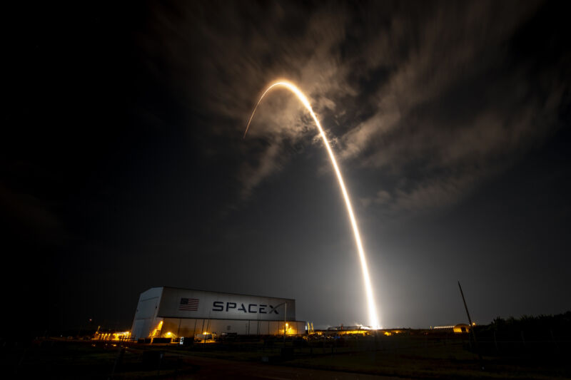 A Falcon 9 rocket streaks into space from Cape Canaveral, Florida, in this long exposure photo.