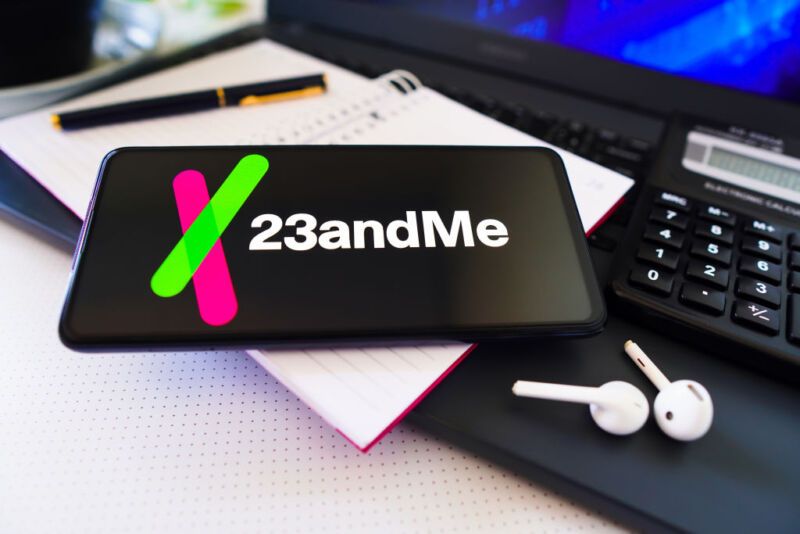The 23andMe logo displayed on a smartphone screen.