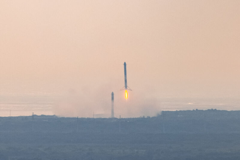 The Falcon Heavy rocket's two side boosters returned to Cape Canaveral for landing after sending NASA's Psyche spacecraft on its way into deep space.