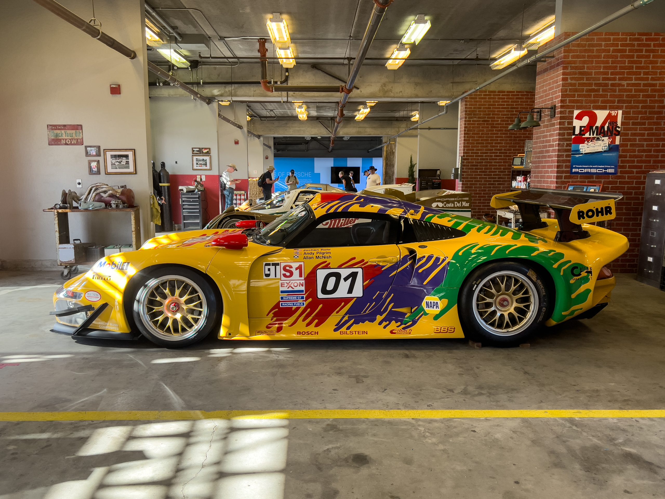 A yellow Porsche 911 GT1