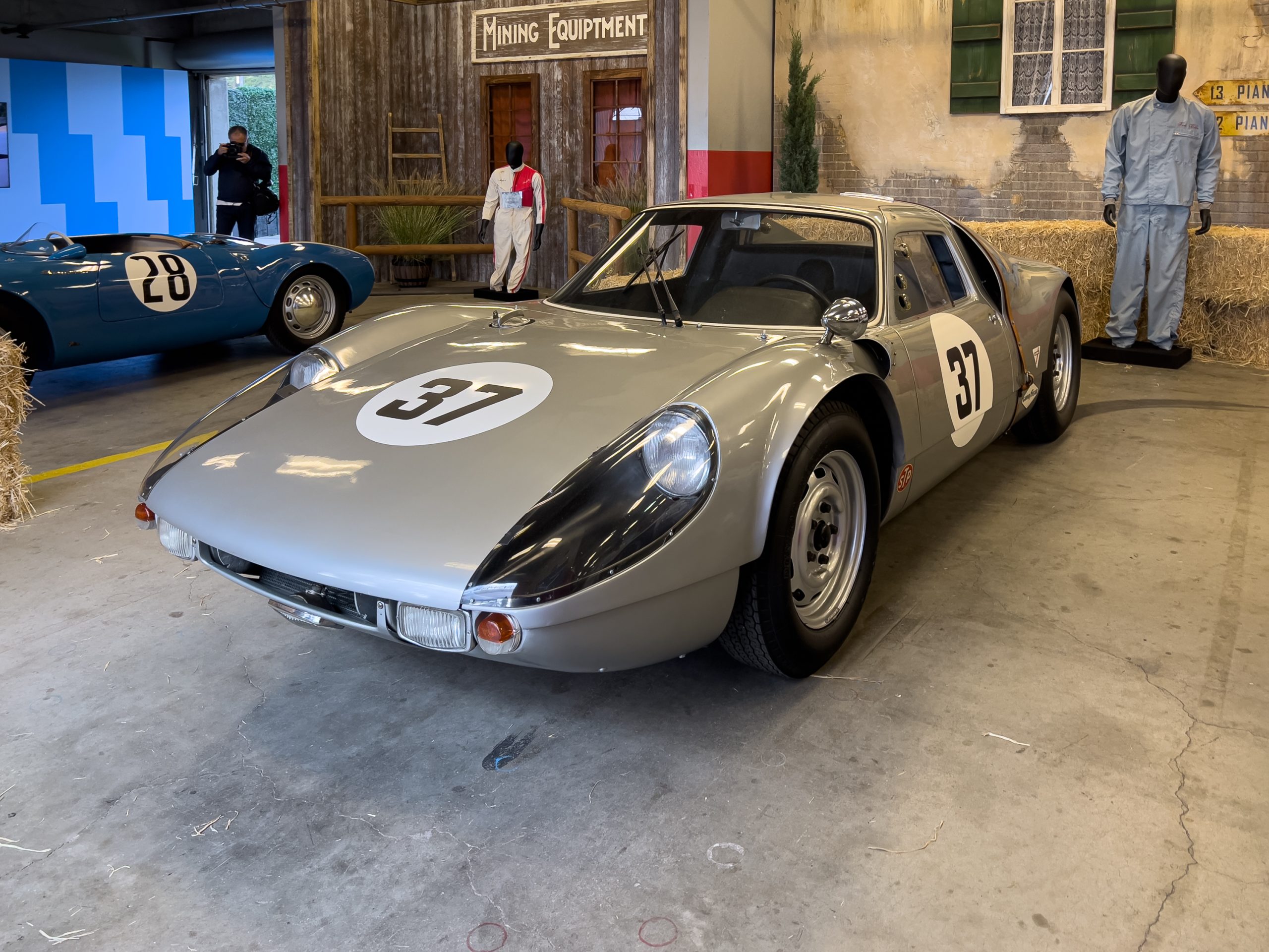 A silver Porsche 904