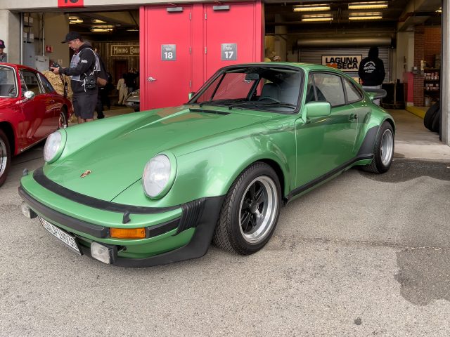 A green Porsche 911 Turbo